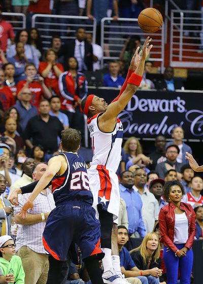 A 3-pointer by Washington’s Paul Pierce was waived off after a review showed it came after the buzzer. Atlanta won by three. (Associated Press)