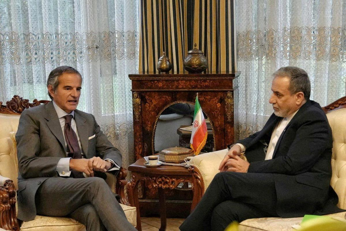 Iranian Foreign Minister Abbas Araqchi meets with International Atomic Energy Agency Director General Rafael Grossi on Monday in Geneva.  (Iranian Foreign Ministry)