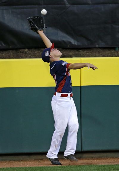 New York left fielder Justin Ryan just misses a three-run home run by Kentucky’s Carson Myers during the first inning. (Gene J. Puskar / Associated Press)