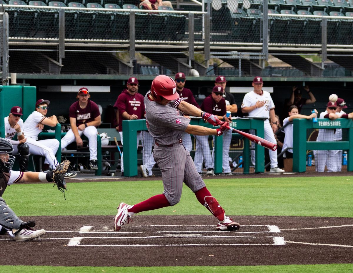 Washington State catcher Alexandre Giguere hits a home run during a nonconference game against Texas State on Friday at Bobcat Ballpark in San Marcos, Texas.  (Courtesy of WSU Athletics)
