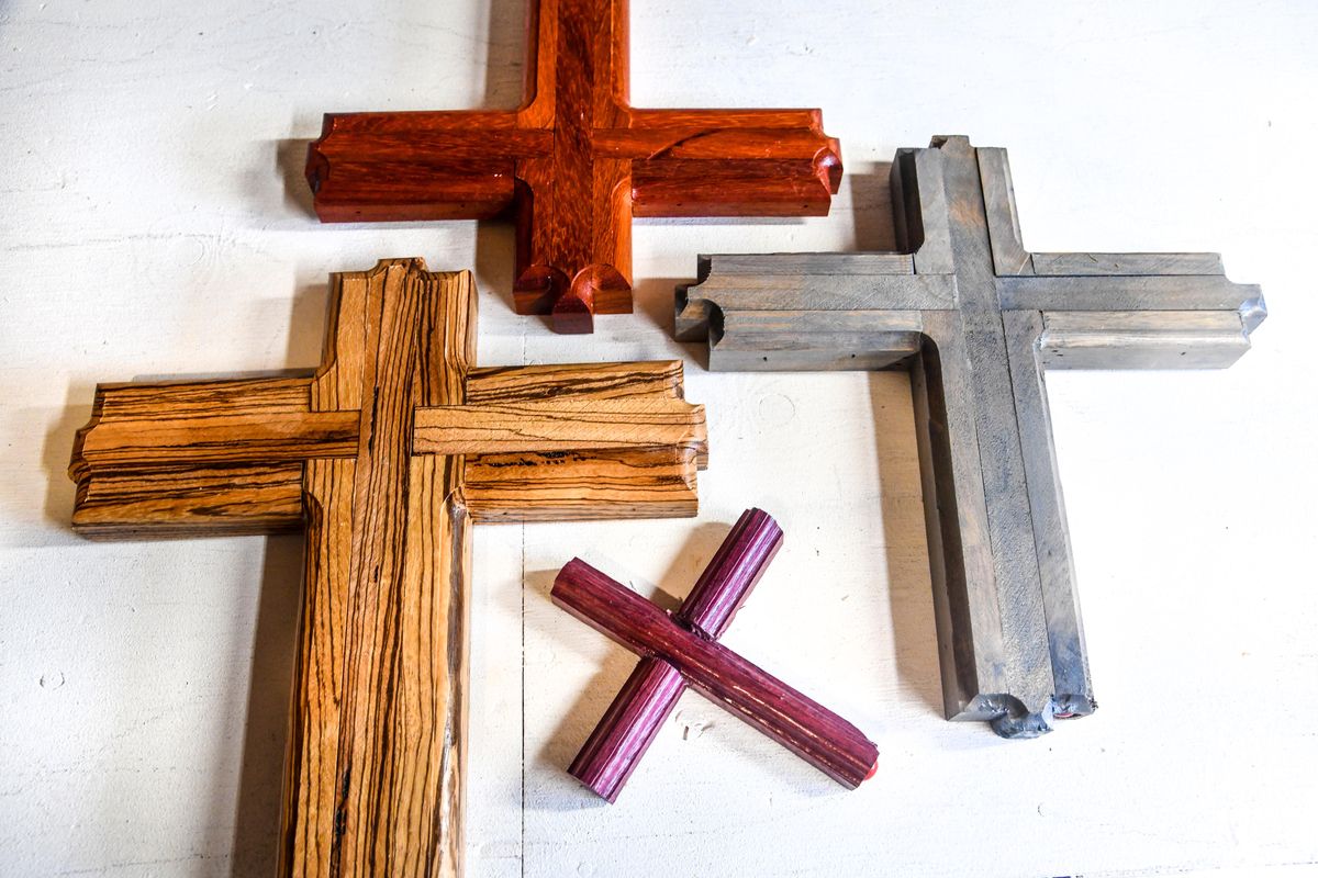Scott Hendricks creates wooden crosses of many sizes and colors in his shop.  (Dan Pelle/THESPOKESMAN-REVIEW)