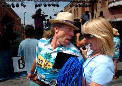 
Grant Shipley, left, of Spokane, and Ritzville Blues Festival organizer Sandy Hansberry dance to the Randy Oxford Band at the 14th annual blues festival in Ritzville, Wash., on Saturday. 
 (INGRID BARRENTINE / The Spokesman-Review)