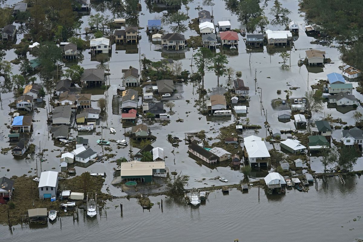 In this Wednesday, Sept. 1, 2021 photo, floodwaters slowly recede in the aftermath of Hurricane Ida in Lafitte, La. On Thursday, Oct. 14, 2021, the National Oceanic and Atmospheric Administration announced that a La Nina has formed, which can be bad news for parts of the parched West. It also could mean a more active Atlantic hurricane season.  (Gerald Herbert)