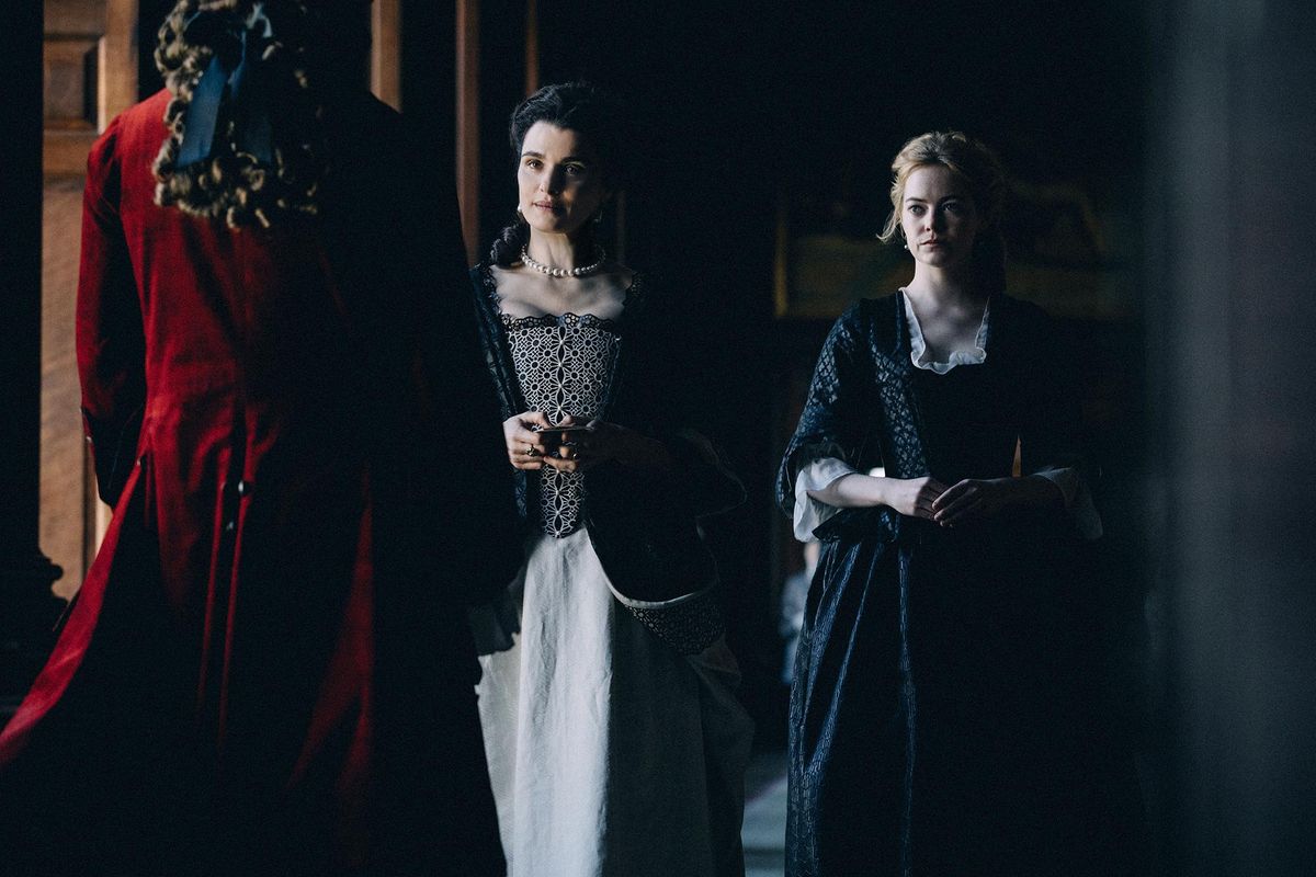 Rachel Weisz, left, and Emma Stone in “The Favourite.” (Atsushi Nishijima / Fox Searchlight Pictures)