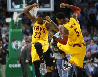 LeBron James, left, wants the Cavaliers to give J.R. Smith a new contract. (Winslow Townson / Associated Press)