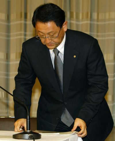 Toyota President Akio Toyoda bows after his press conference in Tokyo on Wednesday.  (Associated Press)