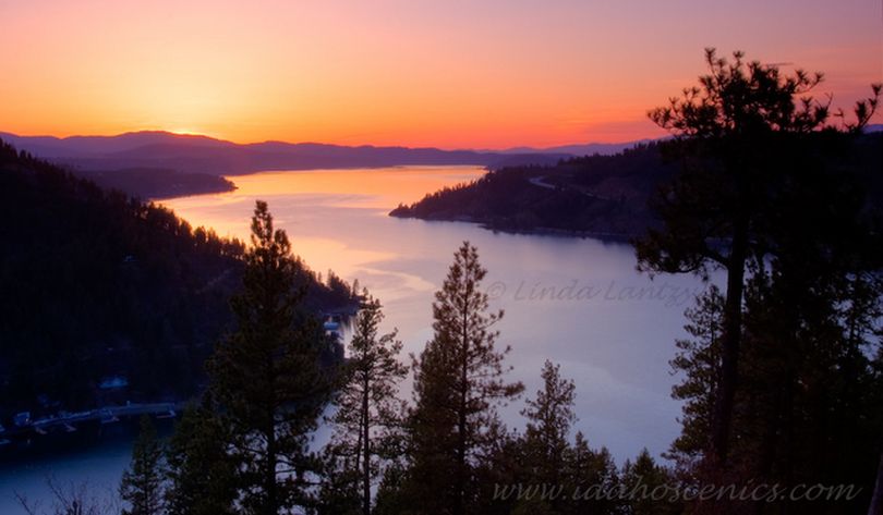 Sunset over Lake Coeur d'Alene's Wolf Lodge Bay from the Mineral Ridge hiking trail. (Linda Lantzy / Idaho Scenic Images)