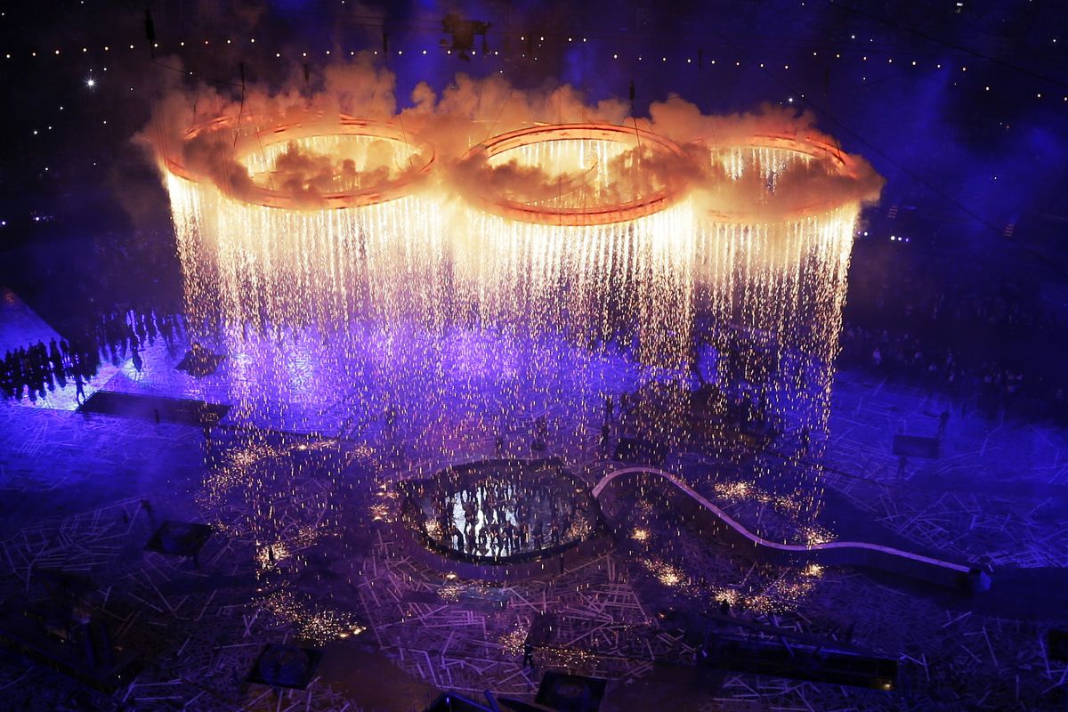 The Olympic rings light up the stadium during the Opening Ceremony at the 2012 Summer Olympics on Friday in London. (Associated Press)