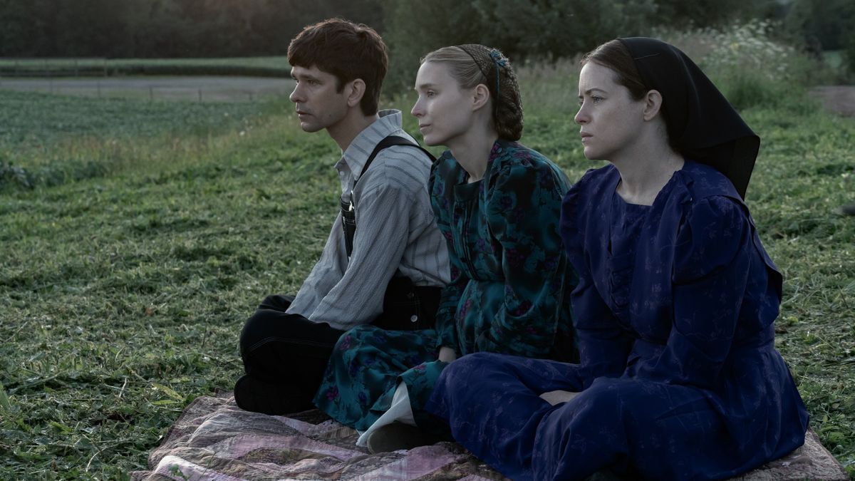 Ben Whishaw stars as August, Rooney Mara as Ona and Claire Foy as Salome in director Sarah Polley’s film “Women Talking.”  (Michael Gibson)