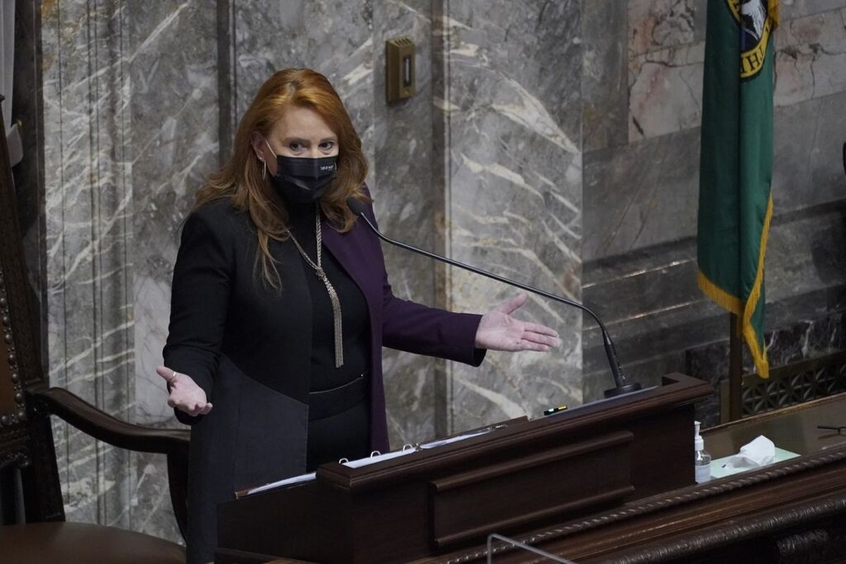 Secretary of State Kim Wyman gestures as she speaks after members of Washington’s Electoral College cast their 12 votes for President-elect Joe Biden at the State Capitol in Olympia on Dec. 14.  (Ted S. Warren/Associated Press)