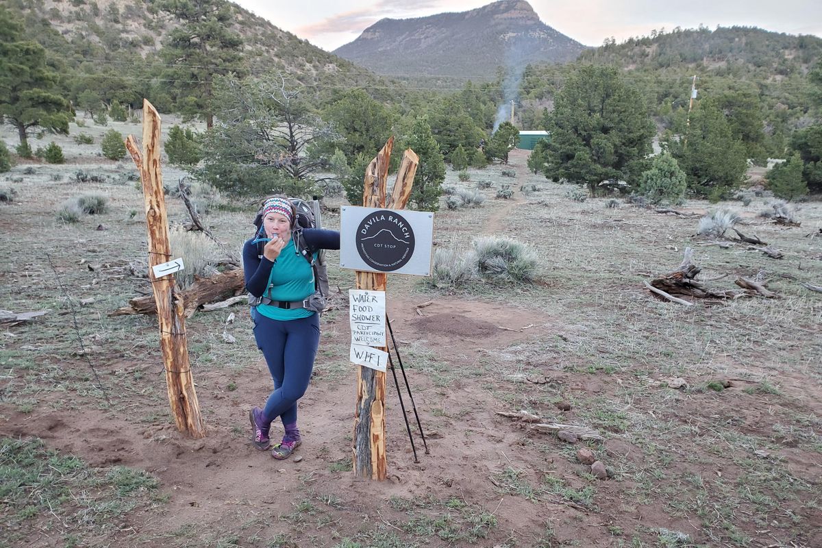 Lauren DeLand poses next to Davila Ranch, a rest stop for Continental Divide hikers in New Mexico. Nichols and Lauren DeLand finished the 3,100-mile Continental Divide Trail on Nov. 2. (Travis Nichols / COURTESY)