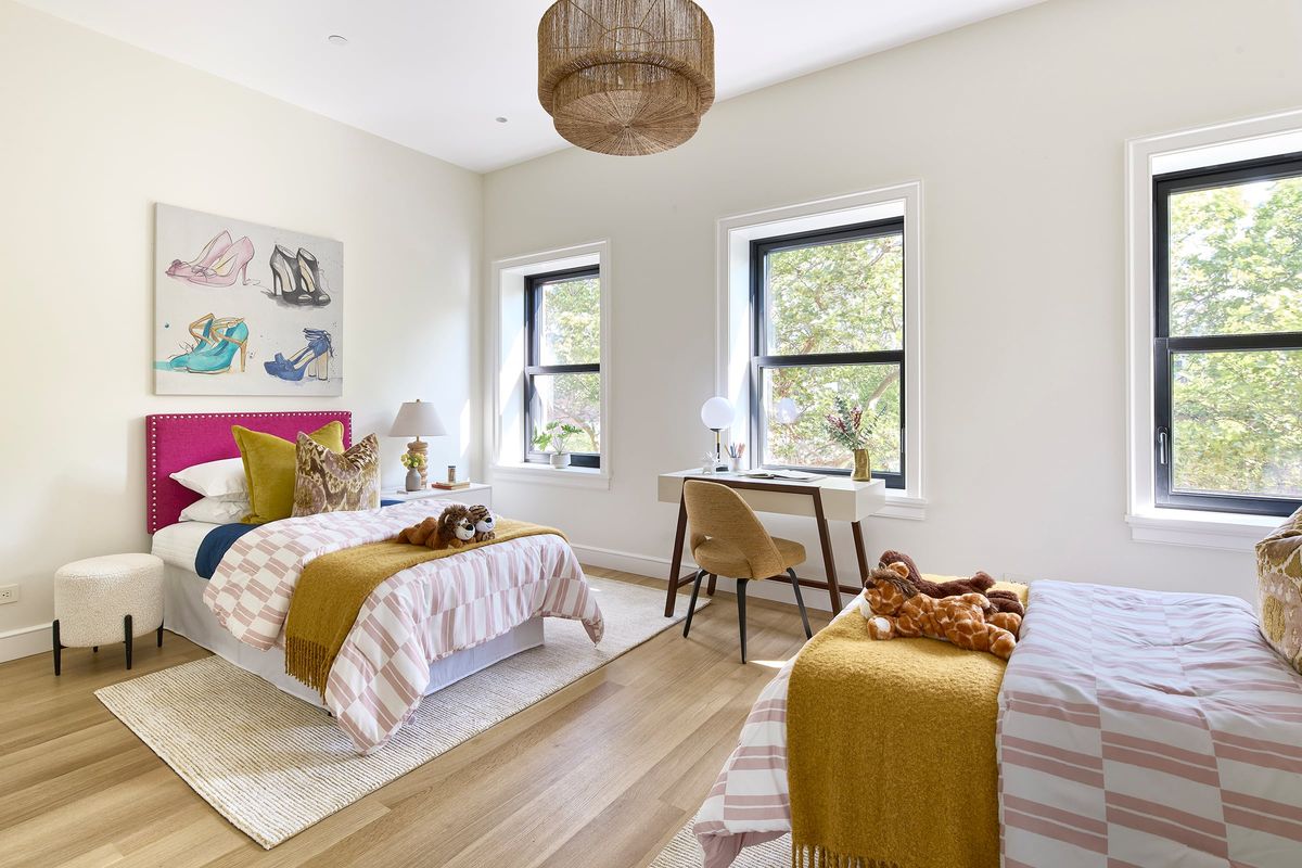 A long children’s bedroom is maximized by the placement of twin beds opposite each other. (Handout/TNS) (Handout)