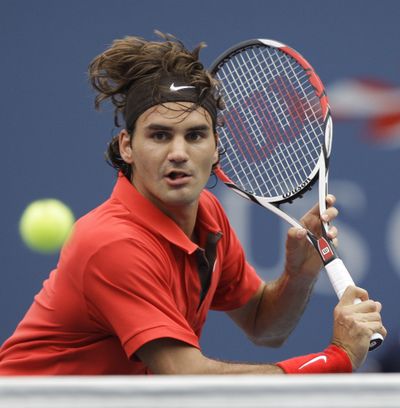 Roger Federer advanced to his 13th singles final in his last 14 Grand Slam events.  (Associated Press / The Spokesman-Review)