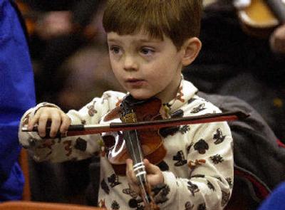 
Carson Vandegriffe, 3, plays 