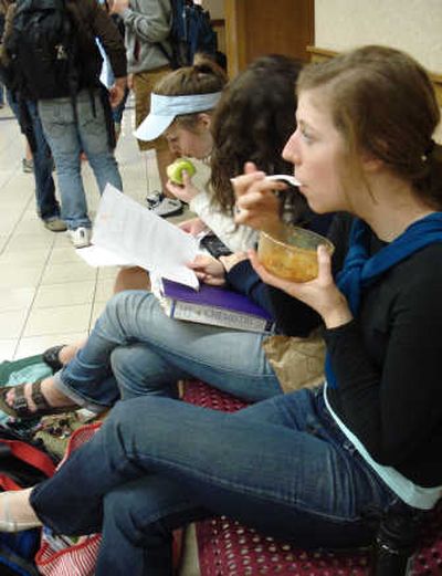 
Lewis and Clark seniors, from left, Kim Ingebritsen, Kaitlin Huppin and Ramsey Larson eat lunch and finish some homework in the hallway. Lewis and Clark
 (ZOE MOORE Lewis and Clark / The Spokesman-Review)