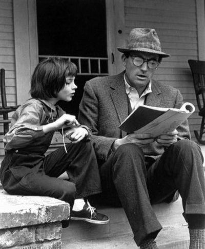 
Gregory Peck and 9-year-old Mary Badham on the set of the film 