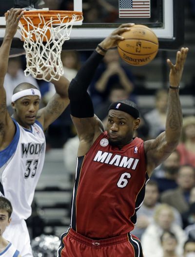 LeBron James, who scored 20 points in Monday’s win, is a big reason the Heat have won a franchise-record 15 straight games. (Associated Press)