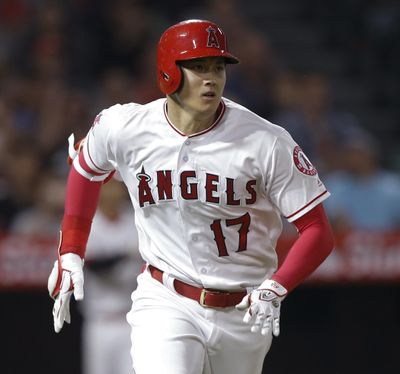 Los Angeles Angels designated hitter Shohei Ohtani runs out an RBI single to right against the Texas Rangers during the fourth inning of a baseball game in Anaheim, Calif., Wednesday, Sept. 26, 2018. (AP Photo/Alex Gallardo) ORG XMIT: ANS108 (Alex Gallardo / AP)