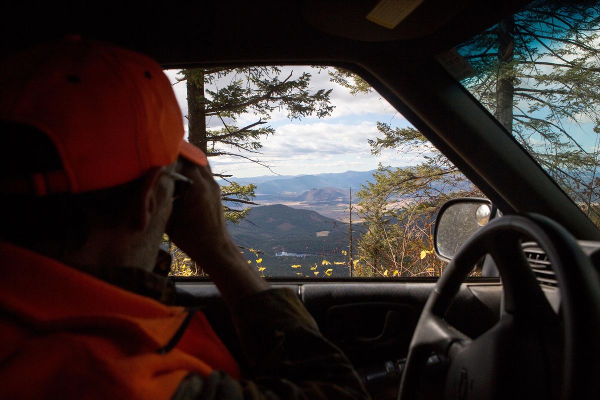Charlie Labrie scouts for deer near 49 Degrees North on the opening day of deer hunting season on Oct. 13, 2018. Eli Francovich/THE SPOKESMAN-REVIEW. (Eli Francovich / The Spokesman-Review)