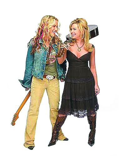 Kristy O and Kelley Shepard perform as Bomshel, and open for Wynonna (far right) on Saturday at The Festival at Sandpoint. Photos: Bomshel,  (Photos: Bomshel, Associated Press / The Spokesman-Review)
