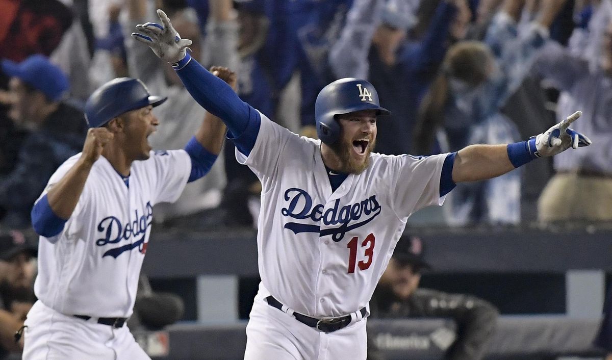 Los Angeles Dodgers’ Max Muncy celebrates his walk-off home run against the Boston Red Sox during the 18th inning in Game 3 of the World Series in Los Angeles. (Mark J. Terrill / AP)
