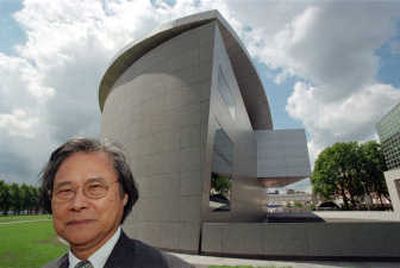 
Kisho Kurokawa stands in front of the wing of the Van Gogh Museum he designed  in Amsterdam, Netherlands. Associated Press
 (File Associated Press / The Spokesman-Review)