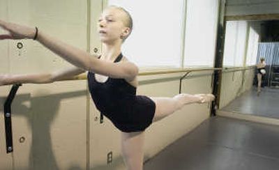 
Adrienne Bot, who recently completed sixth grade at Hutton Elementary School, works on her skills at Ballet Arts Dance Academy. Bot has been selected to attend the School of American Ballet in New York City this summer. 
 (Christopher Anderson / The Spokesman-Review)