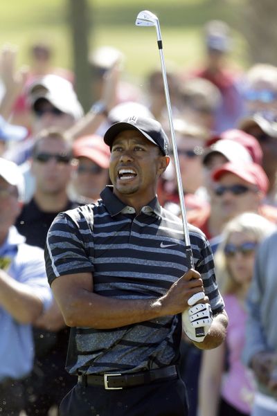 Tiger Woods is tied for first at the Cadillac Championship. (Associated Press)