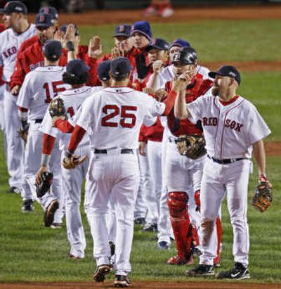 
The Red Sox celebrate after their Game 1 win. Associated Press
 (Associated Press / The Spokesman-Review)