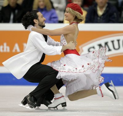 Americans Tanith Belbin, right, and Benjamin Agosto won the original dance in the ice dance competition at the world championships. (Associated Press / The Spokesman-Review)