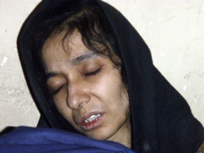 Aafia Siddiqui, a possible Al-Qaida associate, is seen July 17 in custody  in Ghazni City, Afghanistan.  (File Associated Press / The Spokesman-Review)