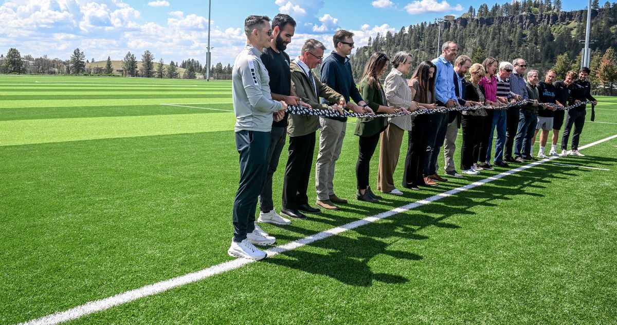 Local dignitaries cut the ribbon Wednesday during the celebration of renovations at Plantes Ferry Sports Complex. The fields were replaced with new turf, new lighting was installed and a new parking lot was constructed. (Kathy Plonka/The Spokesman-Review)