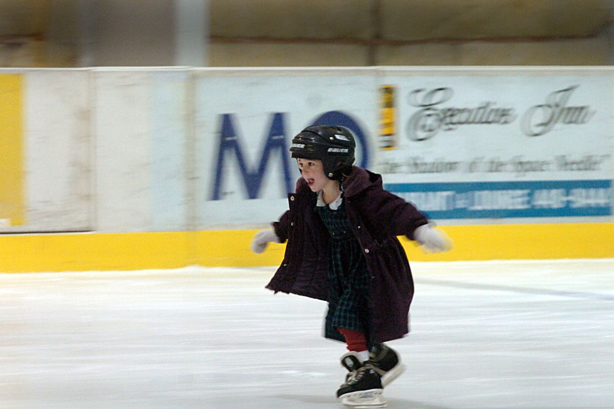 A 5-year-old girl plays on the old Kootenai Youth Recreation Organization ice rink in Coeur d’Alene in this 2004 photo. The new Frontier Ice Arena, which replaced the KYRO arena in 2012, will host a Try Hockey for Free Event on Saturday for children. The new arena, owned and operated by the nonprofit KYRO, replaced the one destroyed in 2008 by heavy snow. (File)