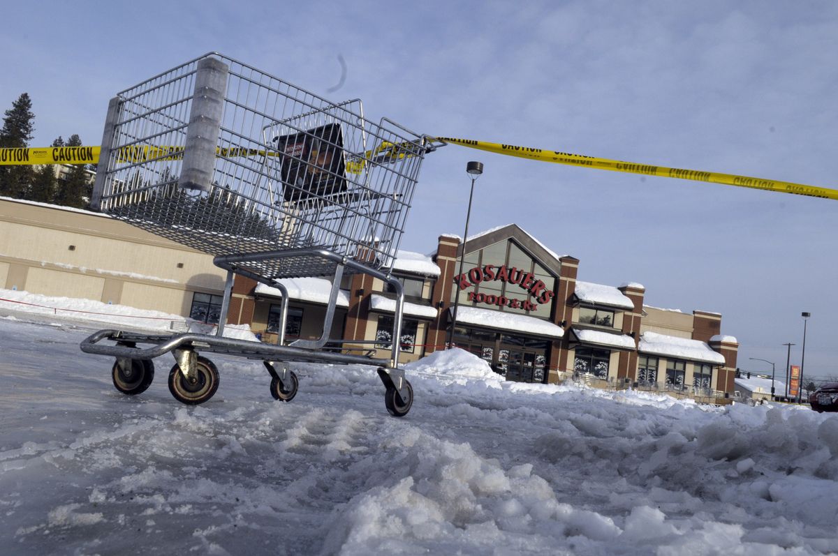 The Five Mile Rosauers at 1724 W. Francis Ave. is roped off Tuesday morning after the roof of the store collapsed  Monday.  (CHRISTOPHER ANDERSON / The Spokesman-Review)