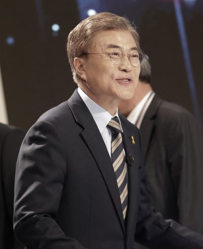 South Korean presidential candidate Moon Jae-in of the Democratic Party of Korea smiles as he prepares for a televised debate for the upcoming May 9, 2017, presidential election in Seoul, South Korea, Tuesday, May 2, 2017. (Ahn Young-joon / Associated Press)