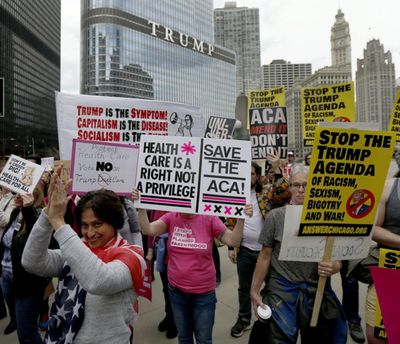 In 2017, protesters gathered across the Chicago River from Trump Tower to rally against the repeal of the Affordable Care Act. Earlier, President Trump and GOP leaders yanked their bill to repeal "Obamacare" off the House floor when it became clear it would fail badly. (Charles Rex Arbogast/Star Tribune/TNS) (Charles Rex Arbogast / TNS)