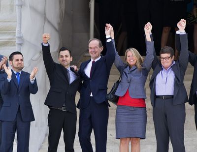 Plaintiffs in Hollingsworth v. Perry, the California Proposition 8 case, celebrate on the steps of the Supreme Court on Wednesday morning. From left are Jeffrey Zarrillo and his partner Paul Katami, attorney David Boies, and Sandra Stier and her partner Kris Perry. (Associated Press)