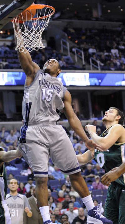 
Georgetown's Austin Freeman dunks against Jacksonville for two of his 15 points in the fifth-ranked Hoyas' 87-55 victory. Associated Press
 (Associated Press / The Spokesman-Review)