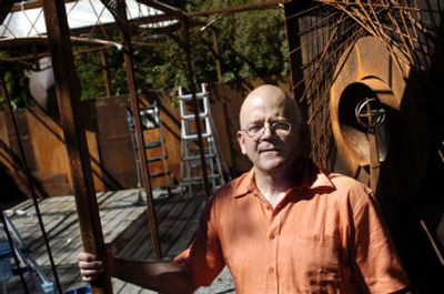 
Jason Sheldon recycles pieces of metal to create functional works of art, such as this in-progress patio enclosure in his garden. 
 (Holly Pickett / The Spokesman-Review)