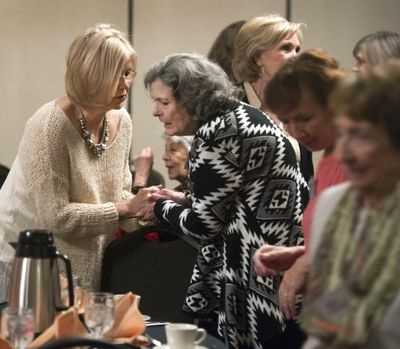 Pamela Brown, left, renews her friendship with Rose Messick before the start of the Spokane Compass Club gathering, Feb. 2, at the Mirabeau Park Hotel in Spokane Valley. The club has been around since 1948, when seven women decided to form their own club to provide more opportunities to meet people and to get to know friends better through hobby groups. (Dan Pelle / The Spokesman-Review)