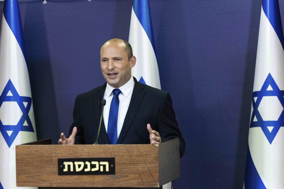 Yemina party leader Naftali Bennett speaks to the Israeli Parliament in Jerusalem, Sunday, May 30, 2021.  (Yonatan Sindel)