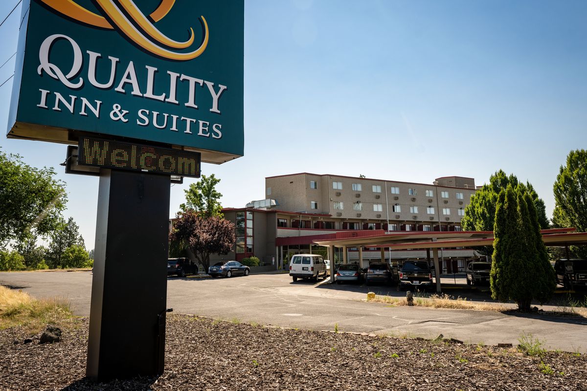 Catholic Charities plans to buy the Quality Inn, at 4301 W. Sunset Blvd., to use as an emergency supportive housing project for singles and couples. West Hills neighbors are suing over the proposal, among other homeless housing plans for the area.  (COLIN MULVANY/THE SPOKESMAN-REVI)