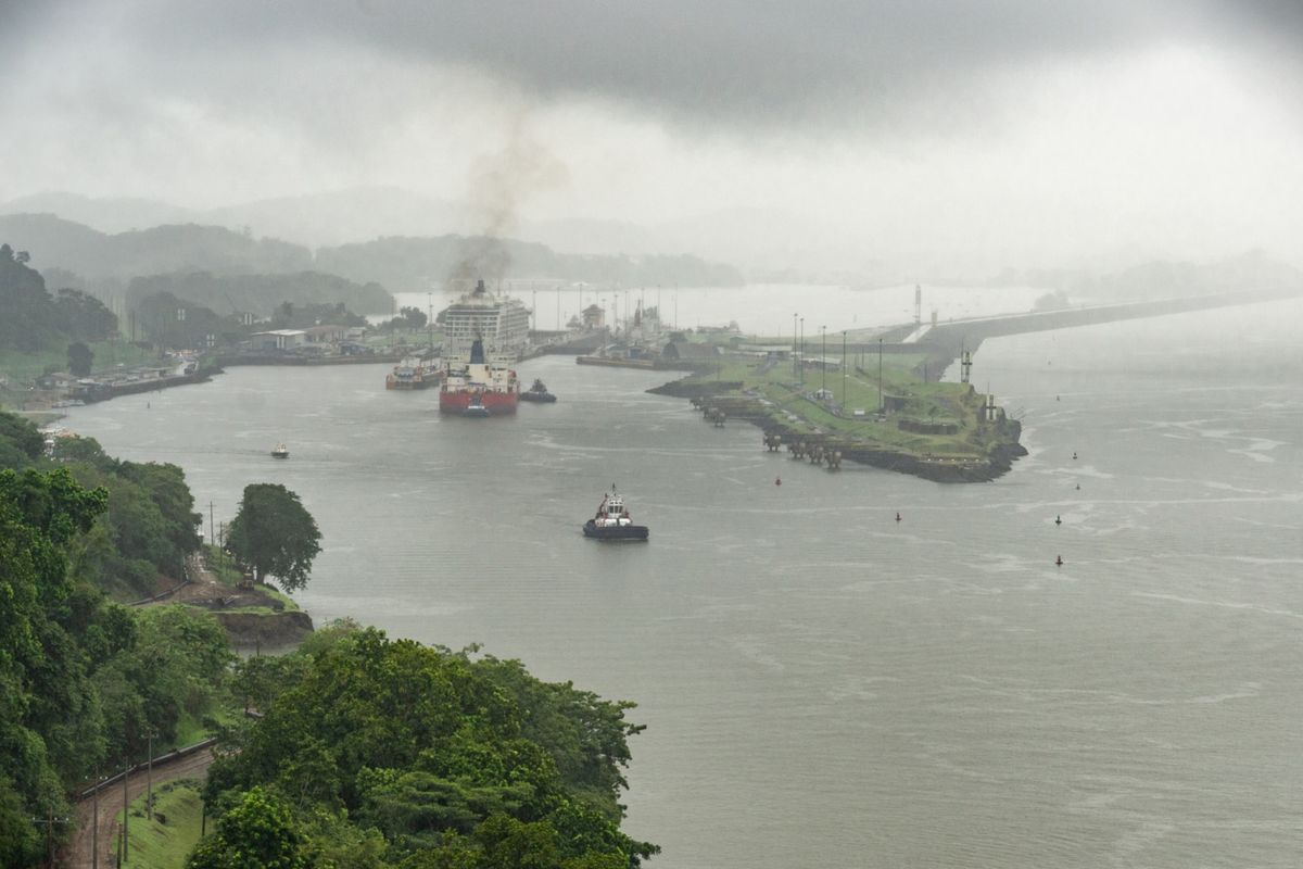 A tugboat navigates a shipping vessel into the Pedro Miguel Locks last month near Paraiso, Panama.  (Walter Hurtado/Bloomberg)