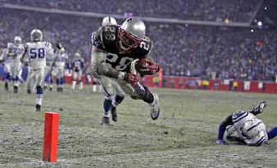 
Corey Dillon, shown during the playoffs against Indianapolis, has taken flight since arriving in New England from Cincinnati. 
 (Associated Press / The Spokesman-Review)