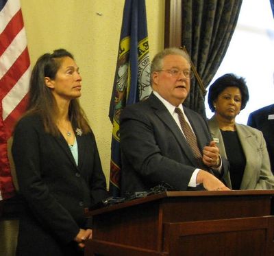 House Minority Leader John Rusche, D-Lewiston, speaks at the Democrats' response to GOP Gov. State of the State message on Tuesday; at left is Senate Minority Leader Michelle Stennett, D-Ketchum; at right is Sen. Cherie Buckner-Webb, D-Boise. (Betsy Russell)