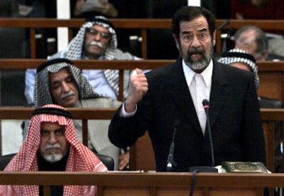 Former Iraqi President Saddam Hussein addresses the court during the resumption of his trial in Baghdad on Wednesday.
(Associated Press / The Spokesman-Review)