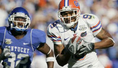 
Florida's Louis Murphy takes a 66-yard touchdown pass in front of Kentucky's Trevard Lindley.Associated Press
 (Associated Press / The Spokesman-Review)