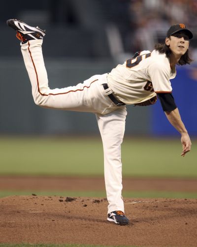 San Francisco’s Tim Lincecum threw a complete-game two-hitter in his postseason debut. (Associated Press)