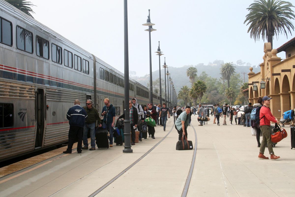 Passengers bound for Seattle on the Coast Starlight disembark at Santa Barbara's Spanish Mission Revival-style depot to stretch for a few minutes before resuming their journey. MUST CREDIT: Photo for The Washington Post by Laura Randall (Laura Randall / For The Washington Post)