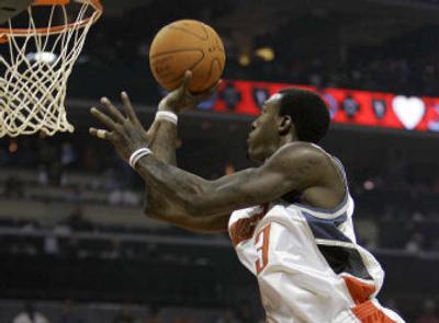
Charlotte Bobcats forward Gerald Wallace zeroes in on the basket Wednesday night.
 (Associated Press / The Spokesman-Review)
